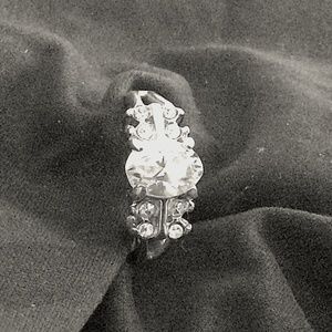 Faux diamond wedding band on light gold-tone band. Size 6